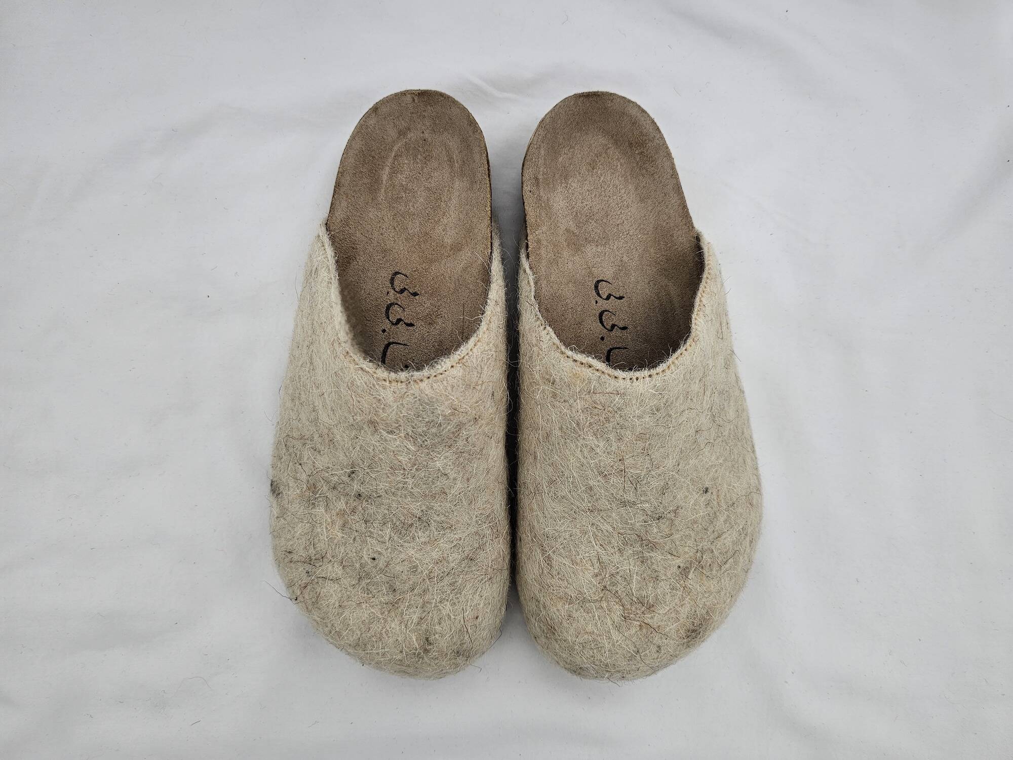 White felt sandals